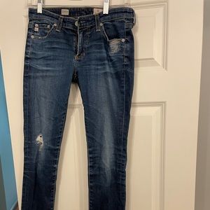 Barely worn women’s AG jeans. Slightly distressed legging super skinny
